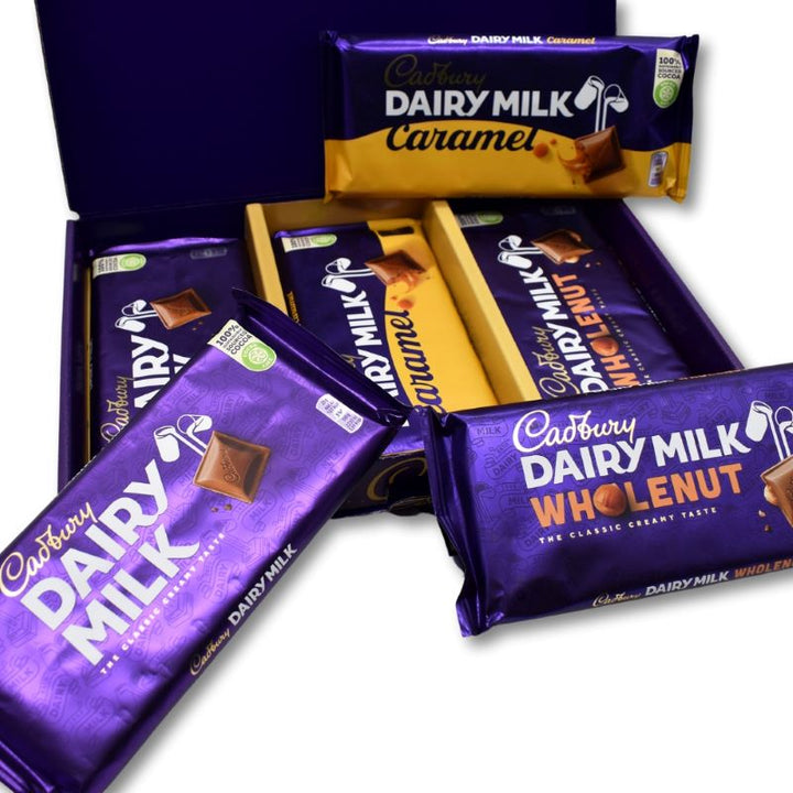 Cadbury Geschenkbox - Cadbury Vollmilchschokolade, Milch-Schokolade mit Rosinen und Mandeln, Milchschokolade mit Karamell-Creme-Füllung